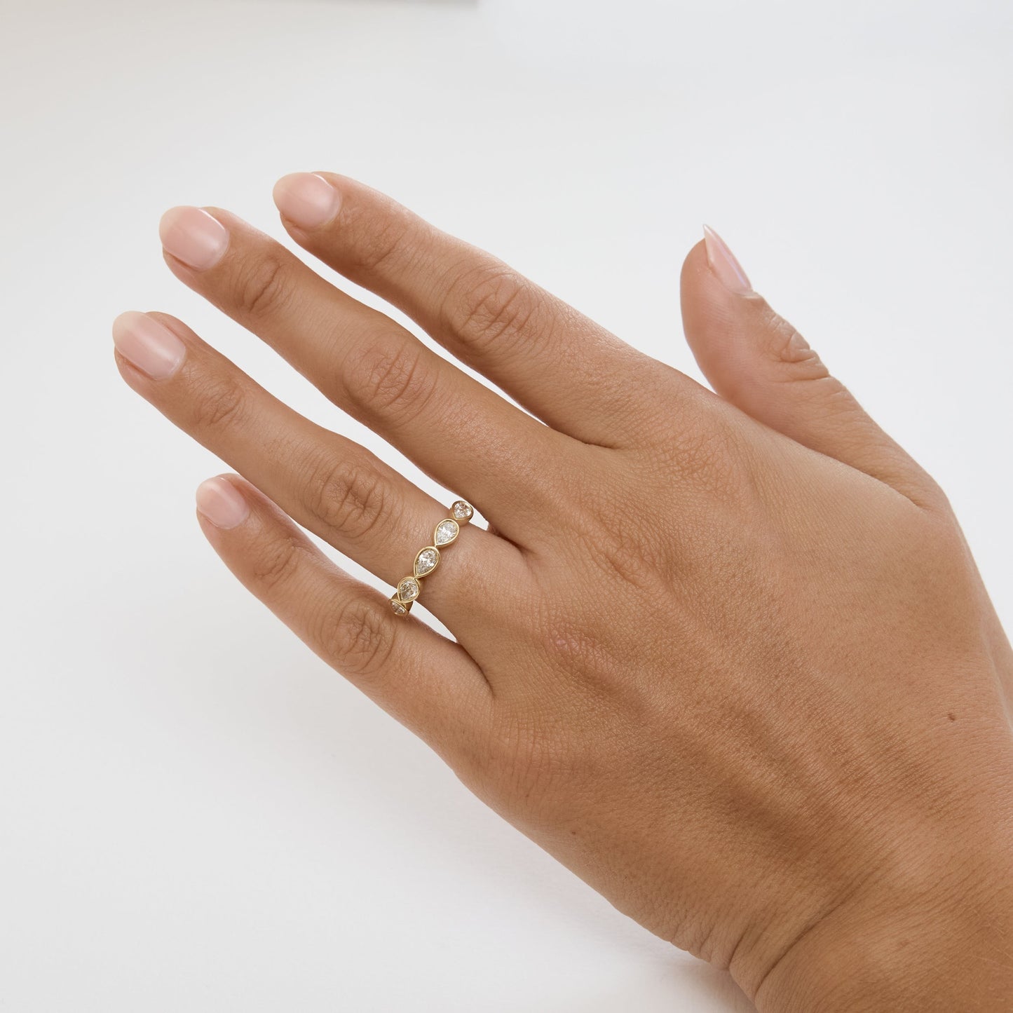 East-West Pear Bezel Set Diamond Wedding Ring