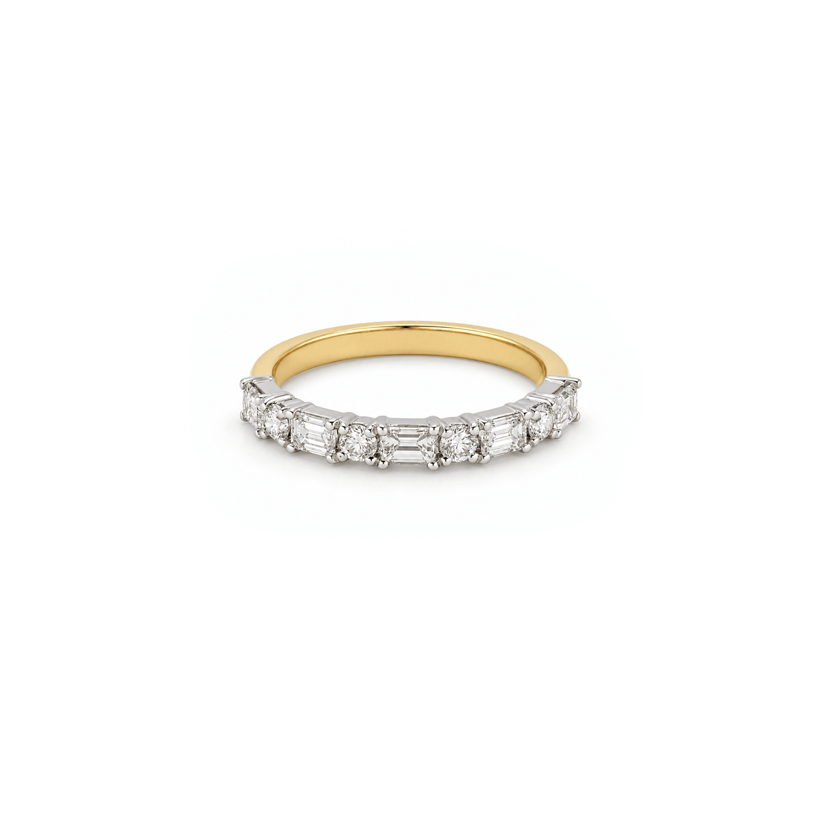 East-West Emerald & Round Diamond Ring
