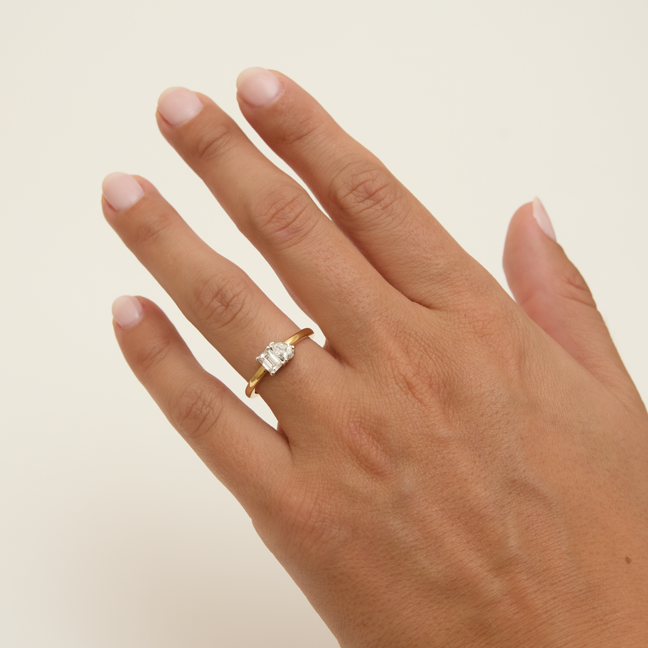 0.65cttw Emerald & Pear Diamond Toi et Moi Ring