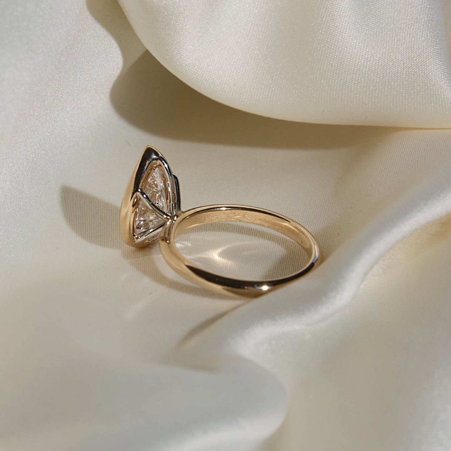 3ct Pear Bezel Solitaire with Platinum Basket