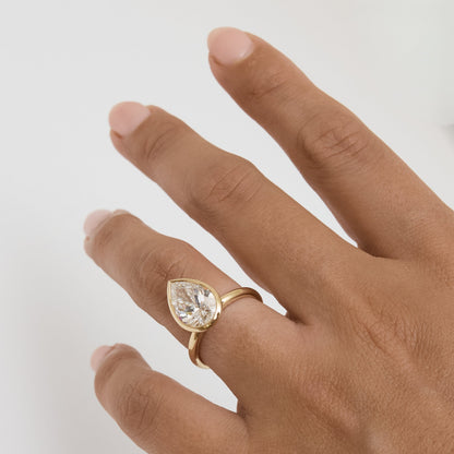3ct Pear Bezel Solitaire with Platinum Basket