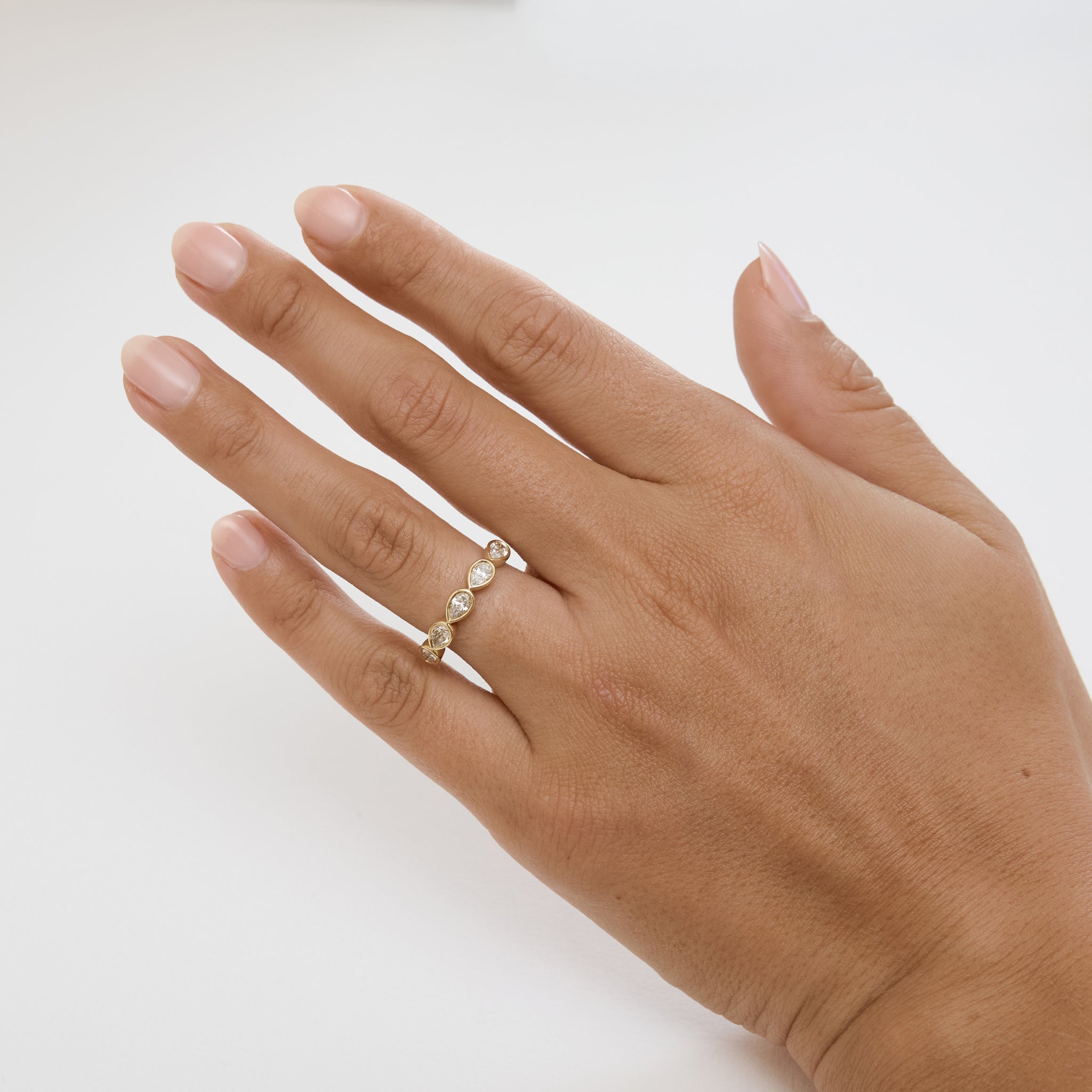 East-West Pear Bezel Set Diamond Wedding Ring